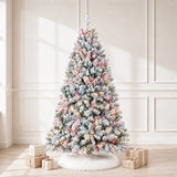 Multicolor pre-lit snow-flocked pinecone Christmas tree in a bright room
