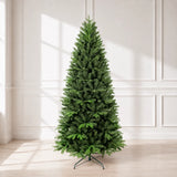 Full unlit memory-wire artificial Christmas tree displayed in a bright room