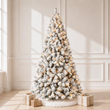 Pre-lit snow-flocked PVC artificial Christmas tree in a bright room