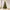 Pre-lit green PVC artificial Christmas tree in a bright room