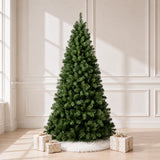 Green PVC artificial Christmas tree with lights turned off